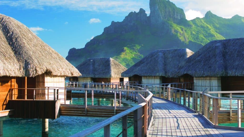 a photo of the overwater bungalows at the four seasons bora bora. 